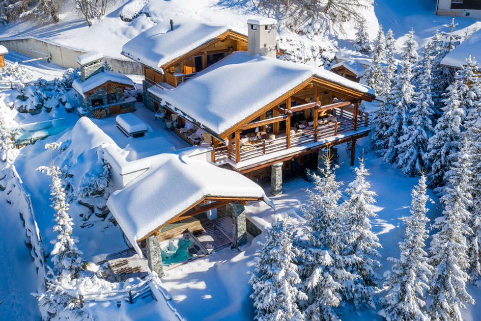 The exterior of Chalet Spa covered in snow, offering one of the best places to stay in Verbier for an ultimate luxury spa retreat. 