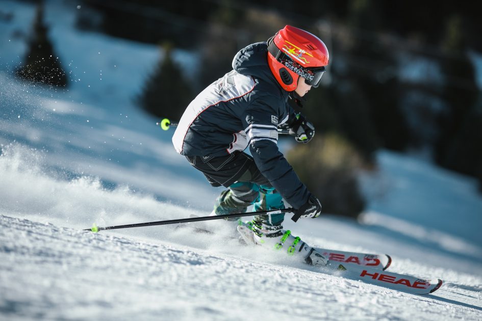 Child skiing in the sun