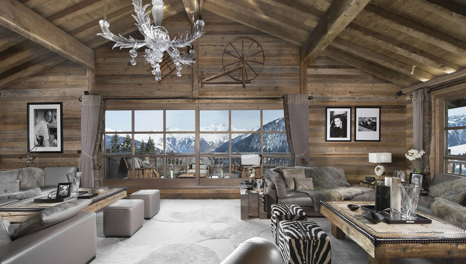 If you enjoy ski holidays in Courchevel 1850, Chalet La Grande Roche's living area could be the free ski Zoom background for reminiscing on mountain memories.