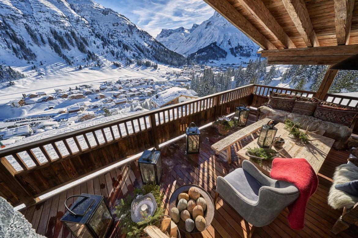 Chalet 1551, Lech Balcony image which overlooks Lech and has comfy outdoor seating.