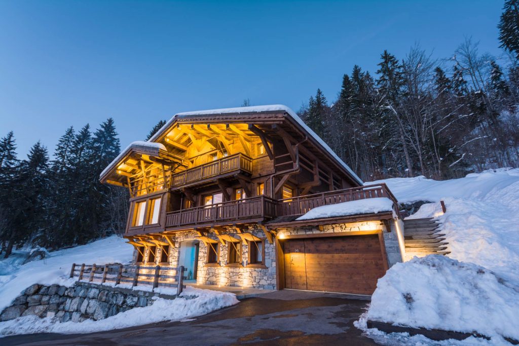 Exterior evening picture of Chalet M, one of our top self catered chalets in Morzine
