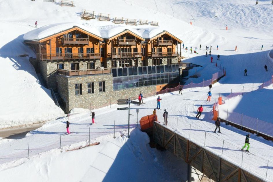 Exterior shot of the pistes and Chalet La Datcha VT, a ski in ski out chalet that makes the ideal base for spring skiing in Val Thorens.