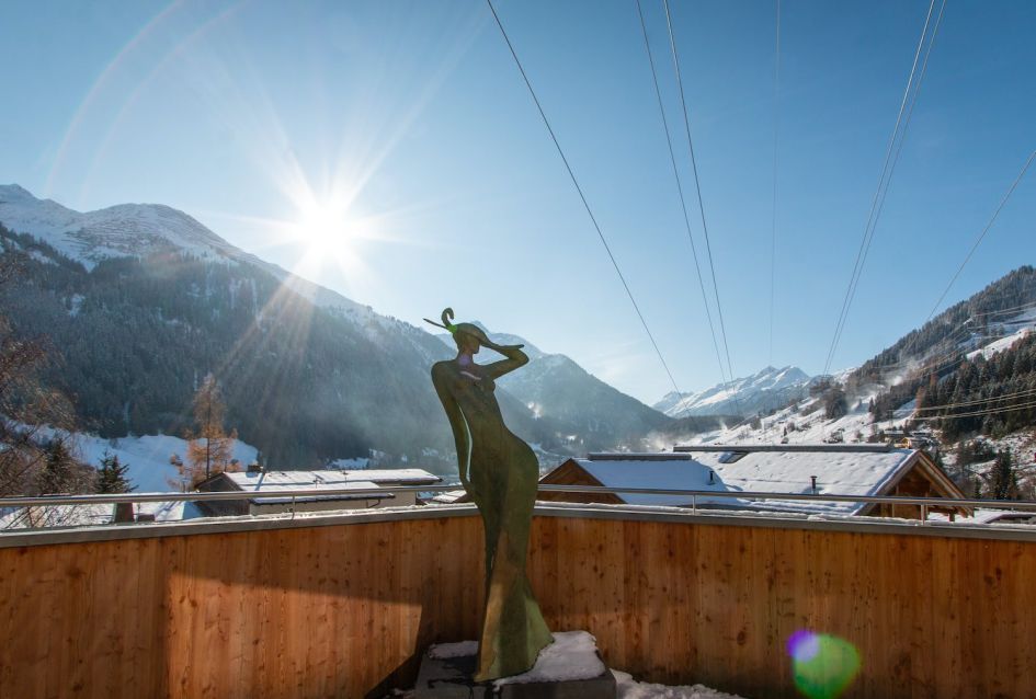 A statue of Artemis, the Greek Goddess from which Chalet Artemis takes its name, on the top floor sun terrace of this luxury chalet in St Anton.