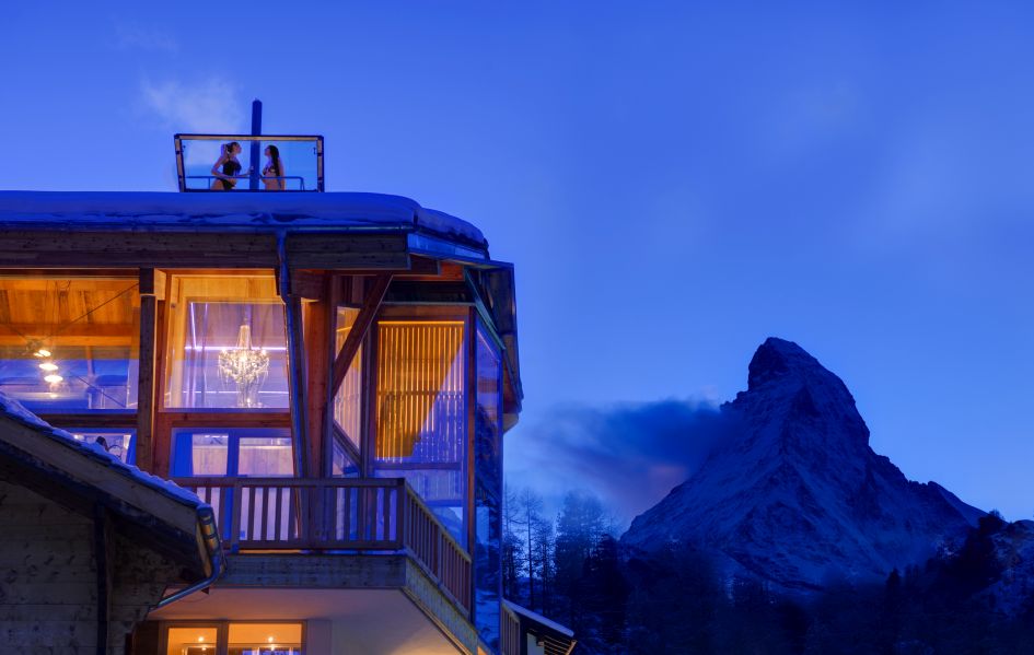 Backstage Chalet in Zermatt, with the Jacuzzi elevated on the roof and the Matterhorn in the background.