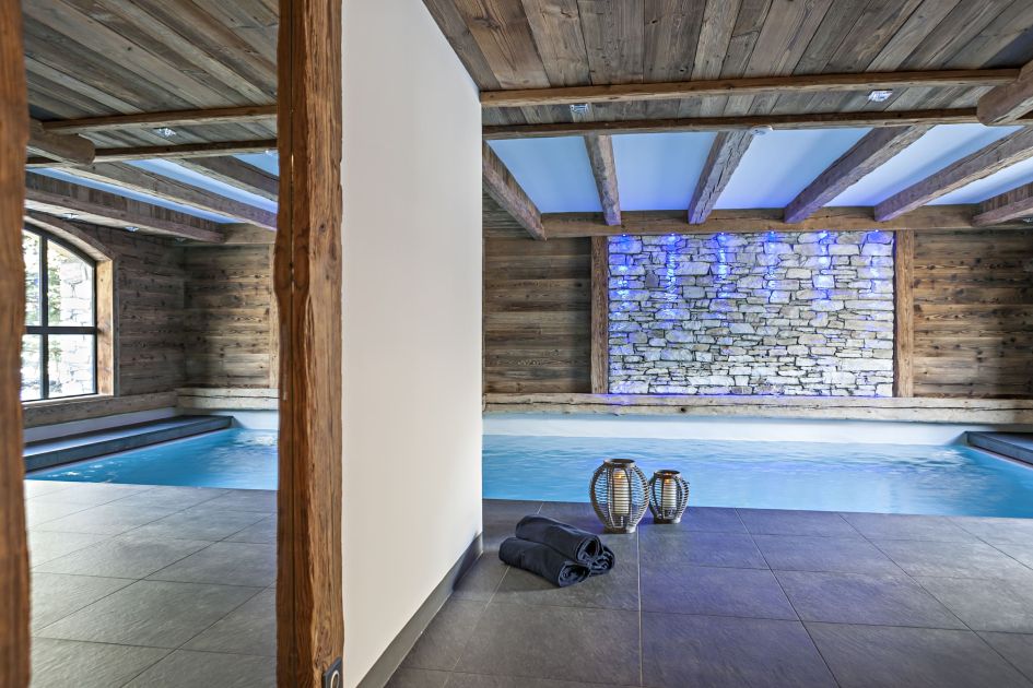 The indoor swimming pool at Chalet Papillon, located close to the snow front of Val d'Isère.