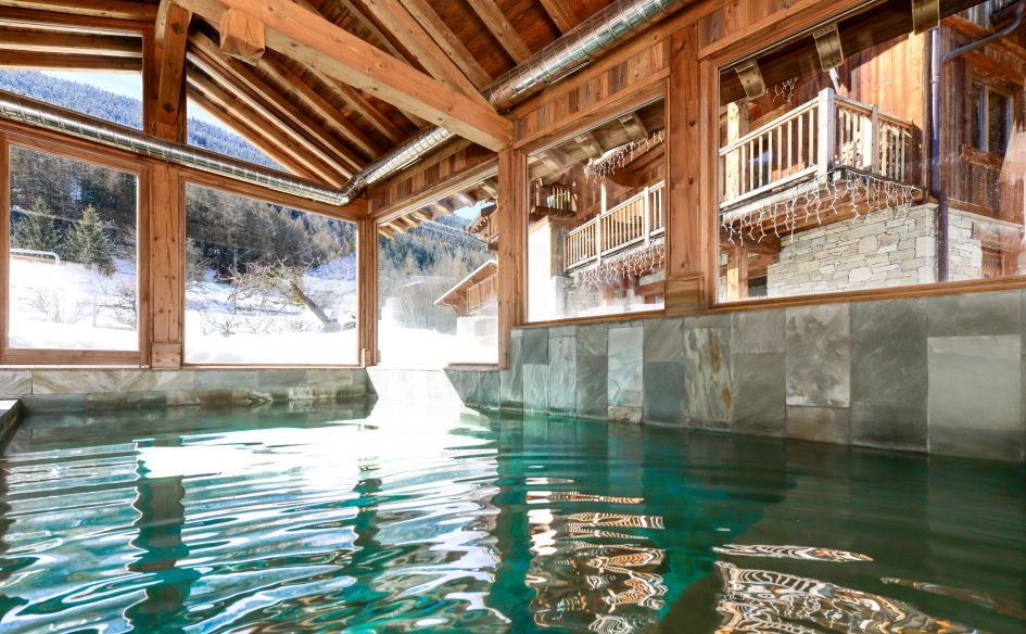 Indoor Pool at Chalet Le Loup Blanc, Courchevel Le Praz Luxury catered chalet in Courchevel Le Praz with an indoor swimming pool, perfect for recharging after a day on the slopes