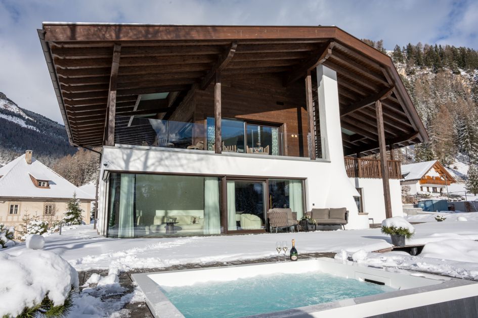Exterior shot of Chalet Villa Carolina in Selva Val Gardena, perfectly set up for a self catered stay on your next luxury ski holiday in Italy.