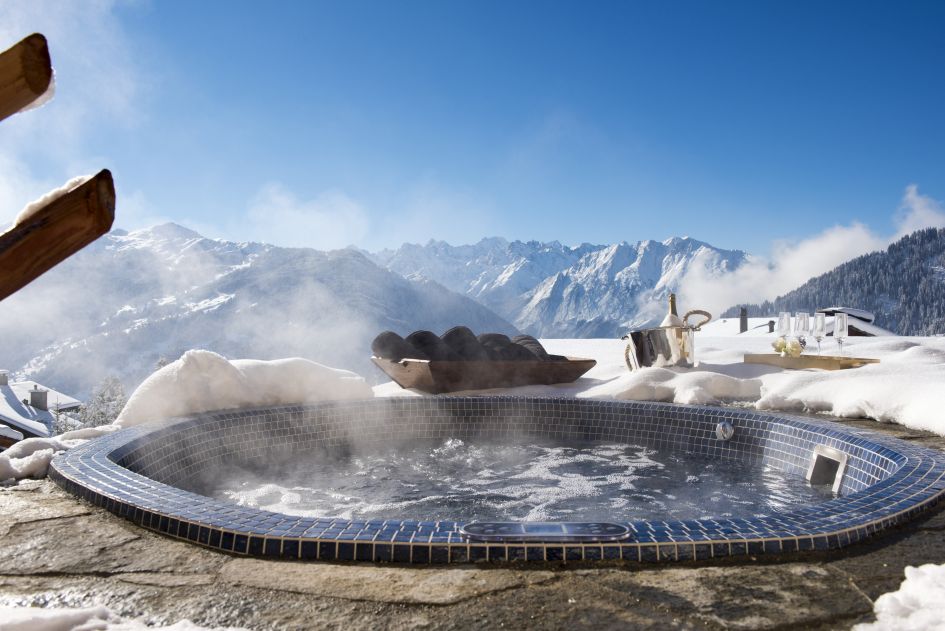 Luxury ski chalet in Verbier with an outdoor hot tub and incredible mountain views.