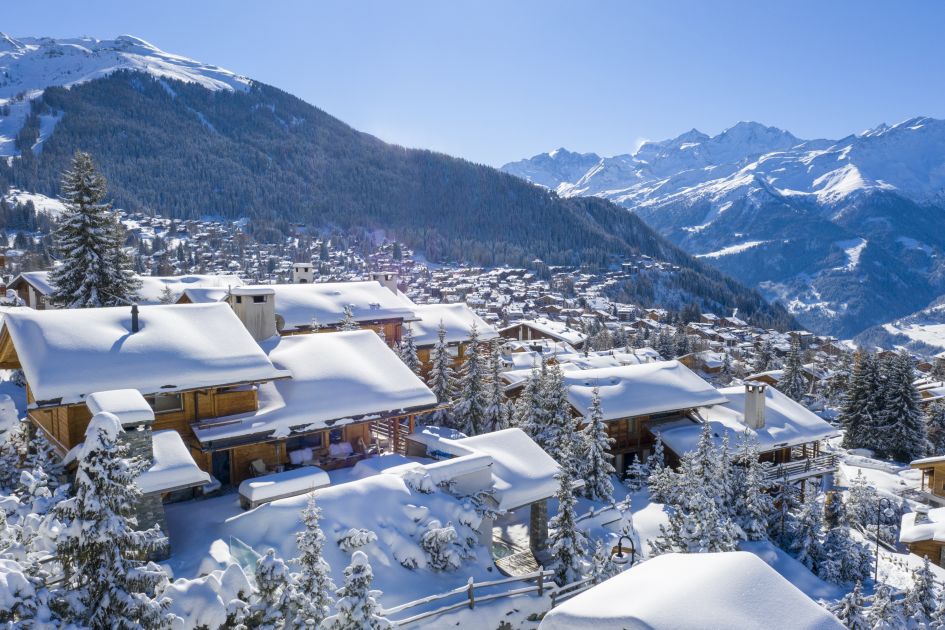 This image features snowy views across Verbier from Chalet Spa.