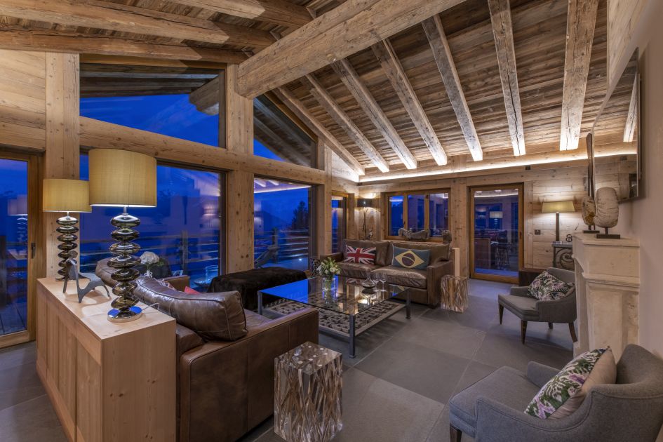 The main living room, partnered with a spacious balcony and stunning views of Verbier.