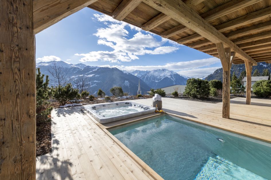 luxury chalet in Verbier with an outdoor pool and beautiful mountain view