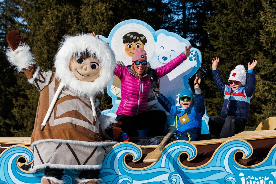 Family ski holidays in Méribel Village are perfect! Kids can enjoy a range of activities, including seeing the local mascot, as shown in this photo.