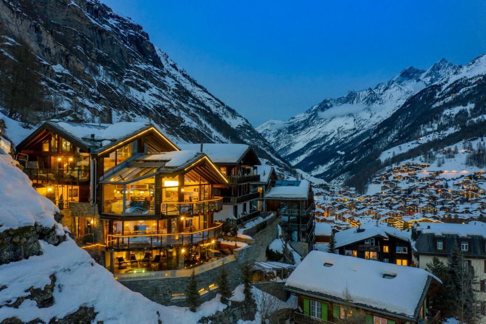 An image of Chalet Zermatt Peak from a drone, also showing some of the best views out of all the luxury ski chalets in Switzerland.