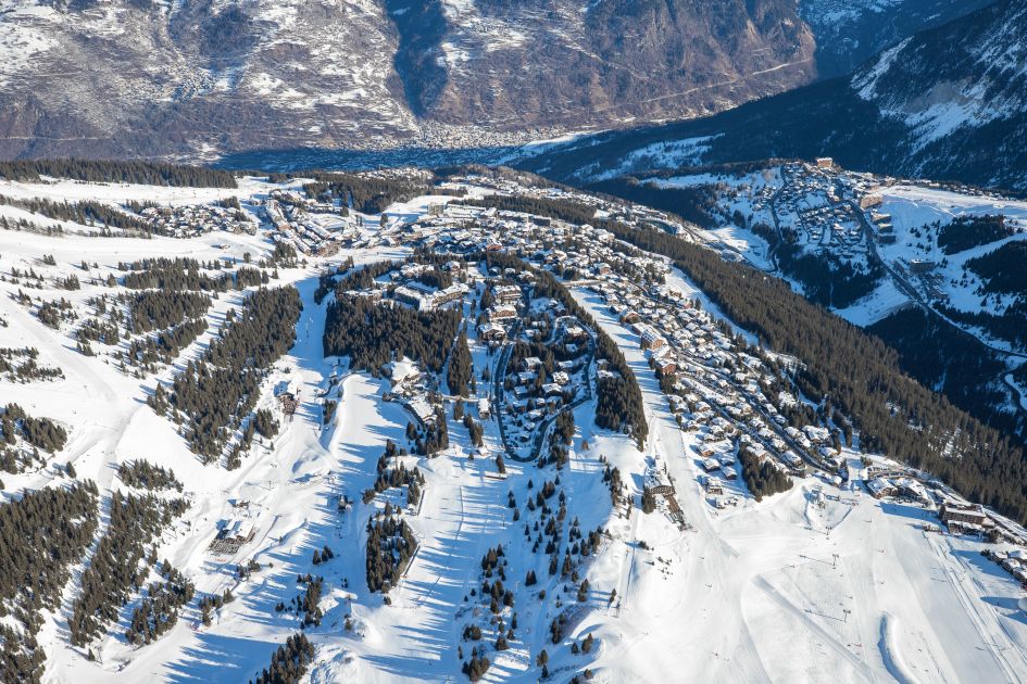 An aerial view of the different pistes and the ski in ski out chalets in Courchevel 1850.