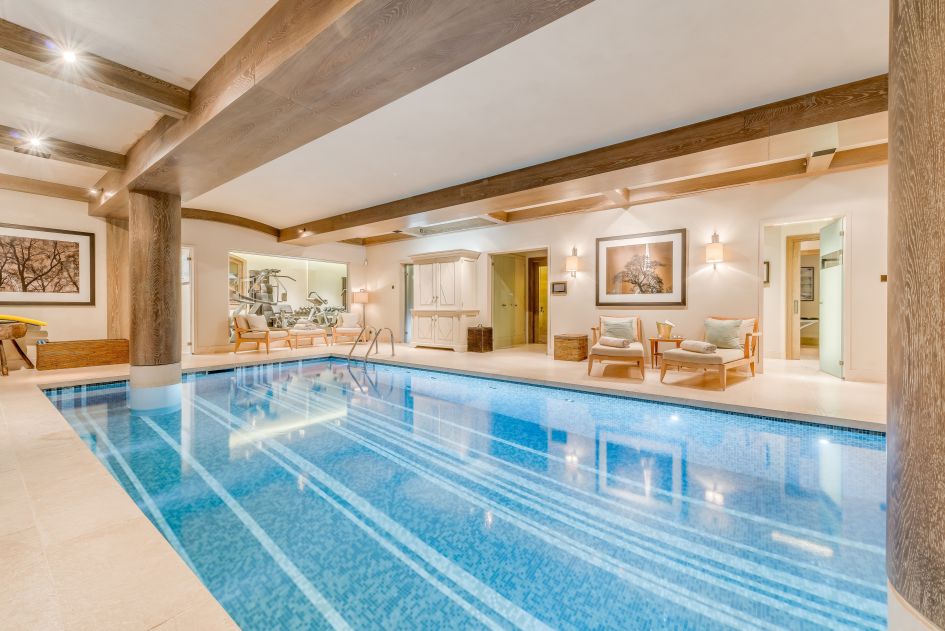 The swimming pool and spa area of Shemshak Lodge in Courchevel 1850.
