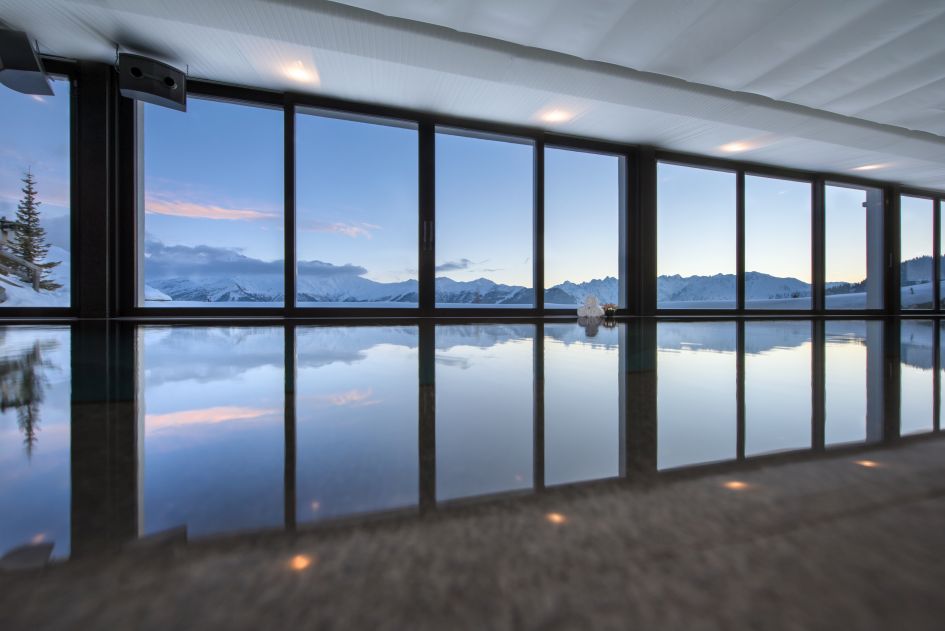 Luxury seasonal chalet with an incredible 25m swimming pool overlooking some breathtaking mountain views.