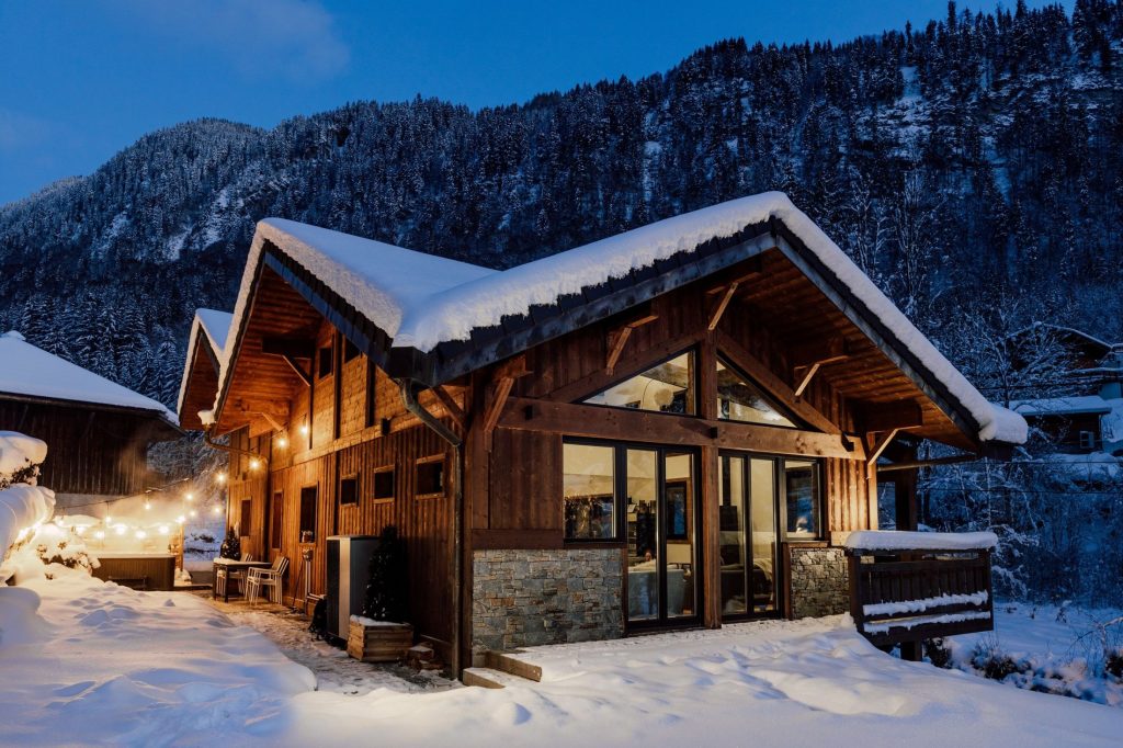 Snowy exterior of Chalet Riviére, a perfect chalet for your sustainable winter holidays.