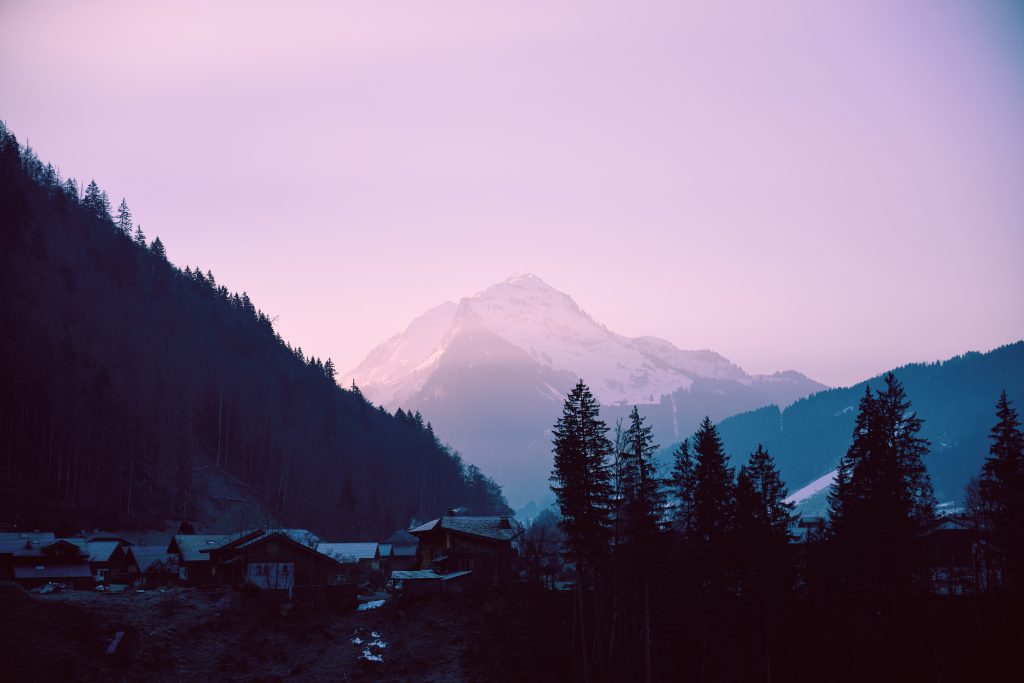 Pink skies in Morzine, one of the best resorts for a sustainable winter holiday.