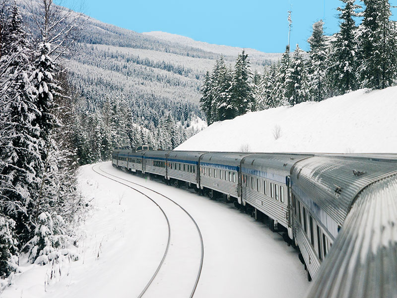 Snow train in winter, perfect for if you want to get involved with eco-conscious winter travel.