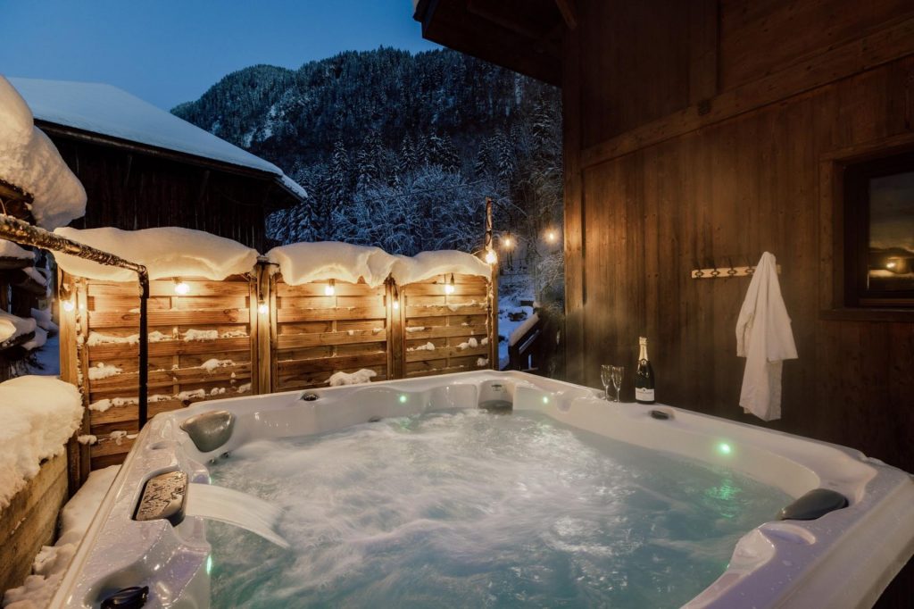 Luxury hot tub at Chalet Riviére, one of the leading sustainable ski chalets in Morzine.