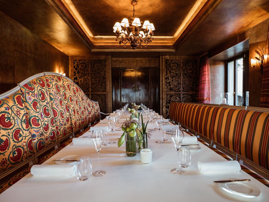 The elegant and cosy dining room of Da Vittorio in St Moritz.