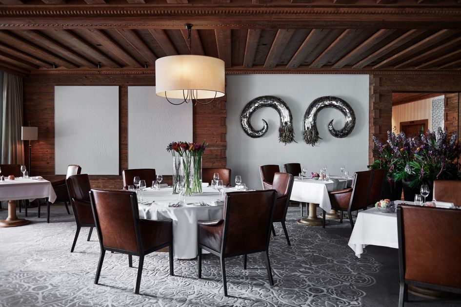 Fine dining at one of the best hotels in the Swiss Alps in the restaurant Sommet, at The Alpina Gstaad hotel. 