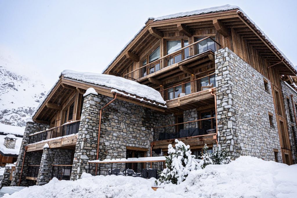 Snowy exterior of Silverstone Lodge, a luxury ski holiday residence in the French Alps.