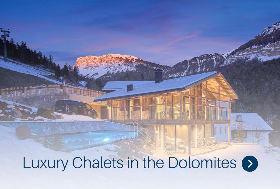 Luxury Chalets in the Dolomites Chalet Vilaiet, with "Luxury Chalets in the Dolomites" written and an arrow next to it, to showcase the Dolomites vs Alps chalets.