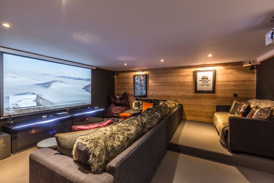 Large theatre room, luxurious sofas and a projector screen. Incredible facility worthy of a Chamonix chalet for families.