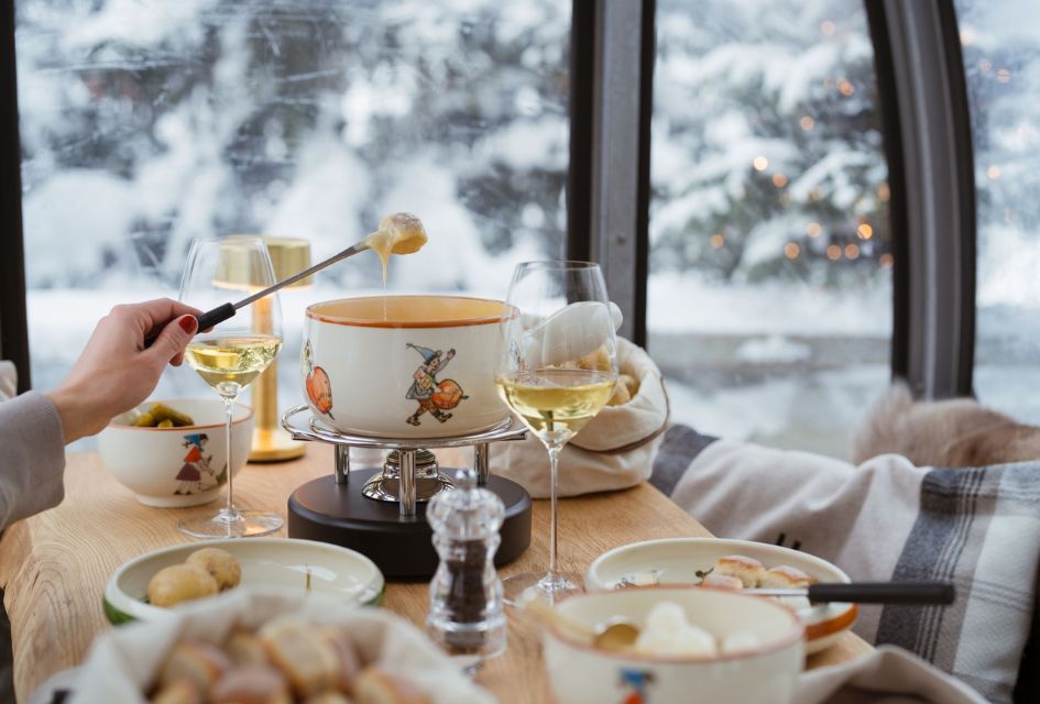 Fondue Gondola with the Carlton Hotel, St Moritz Fondue and white wine in a gondola, an experience with the Carlton Hotel in St Moritz, and a great way to spend Christmas in the Swiss Alps