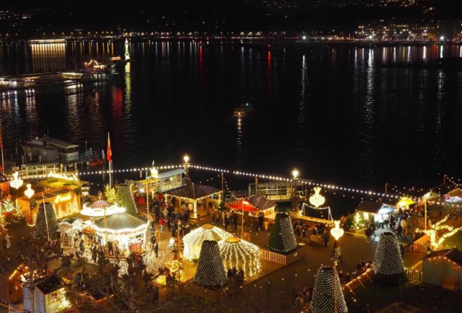 Christmas Markets in Geneva. Credit: Noël au Quai Lakeside location Christmas marketing in Geneva. Pretty tinkling lights adorn stalls and carousels setting the magic atmosphere for the festive time.
