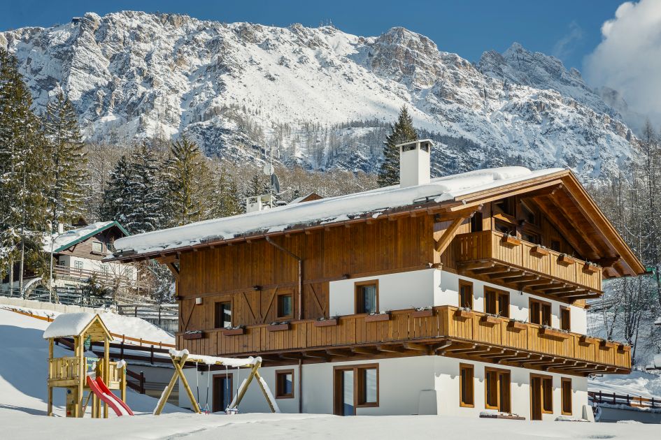 LV | 01 Dolce Vita, Cortina An exterior shot of LV | 01 Dolce Vita, one of the best family ski chalets in the Dolomites, Italy.