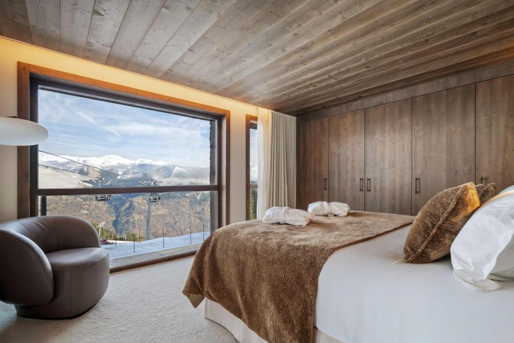 CGI Rendering of a bedroom in the Atmosphere Residence, Courchevel 1850.