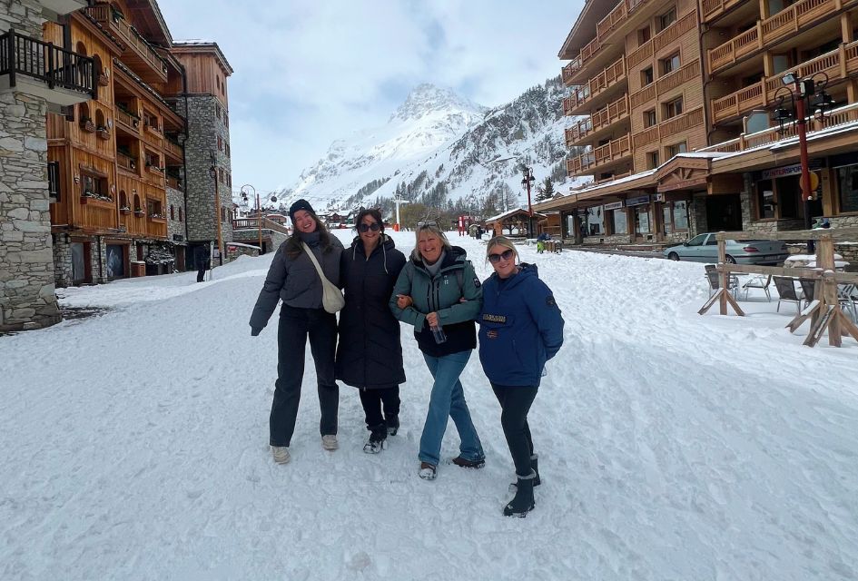 A few of our Ski Specialists out in resort brushing up on their knowledge of Val d'Isere. They are stood near the snow front, a central location for a luxury ski holiday in Val d'Isere. 