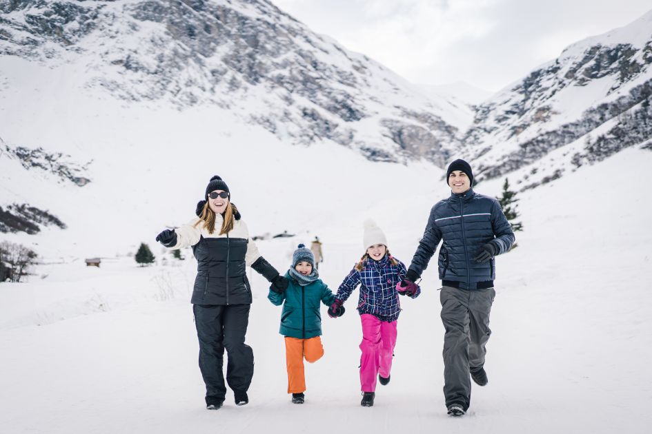 Credit: Anna Ivanova via Val d'Isère Tourism A family out together in the snow, exploring Val d'Isère.