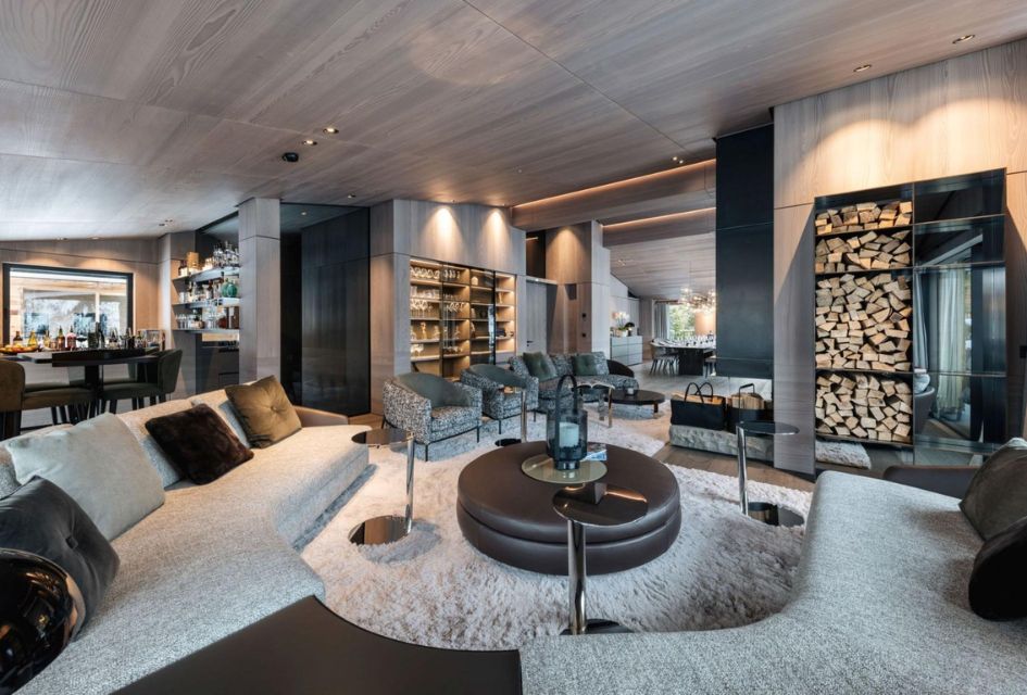 Le Chalet, Lech Open-plan living and dining area, plush seating to relax by the fire with a home-style bar.