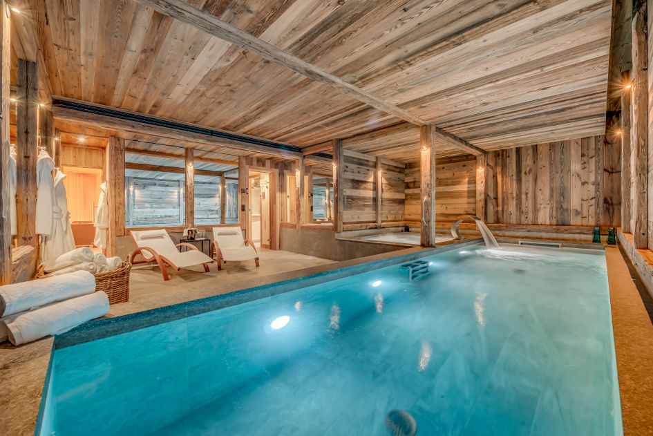 Swimming pool and indoor hot tub in the spa area of the luxury catered Chalet Juno in Val d'Isère.