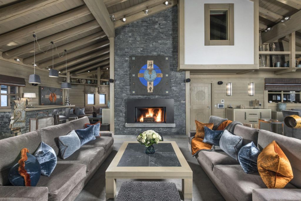 Chalet Panmah, Courchevel 1850 A beautifully designed open-plan living area, the kitchen and dining area are clearly within view with a masterfully designed living space.