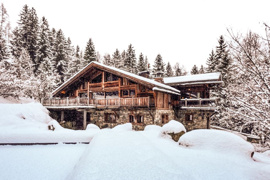 Amazon Creek, Chamonix Chalet Amazon Creek surrounded by snow-covered pine trees in Les Bossons.